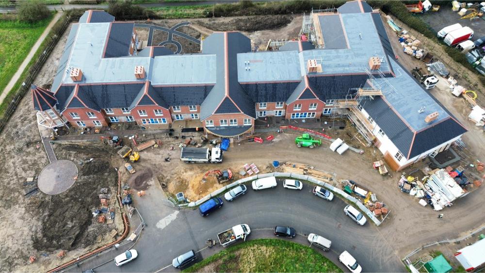 drone shot of yarnley house with rear garden view