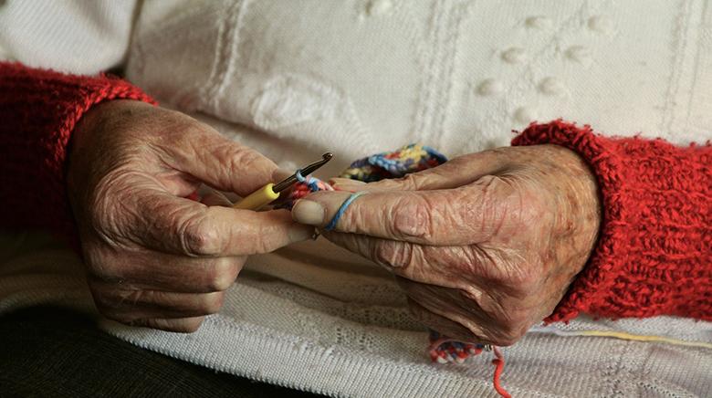 one of our residents knitting