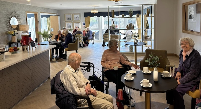 residents sat in our cafe area chatting