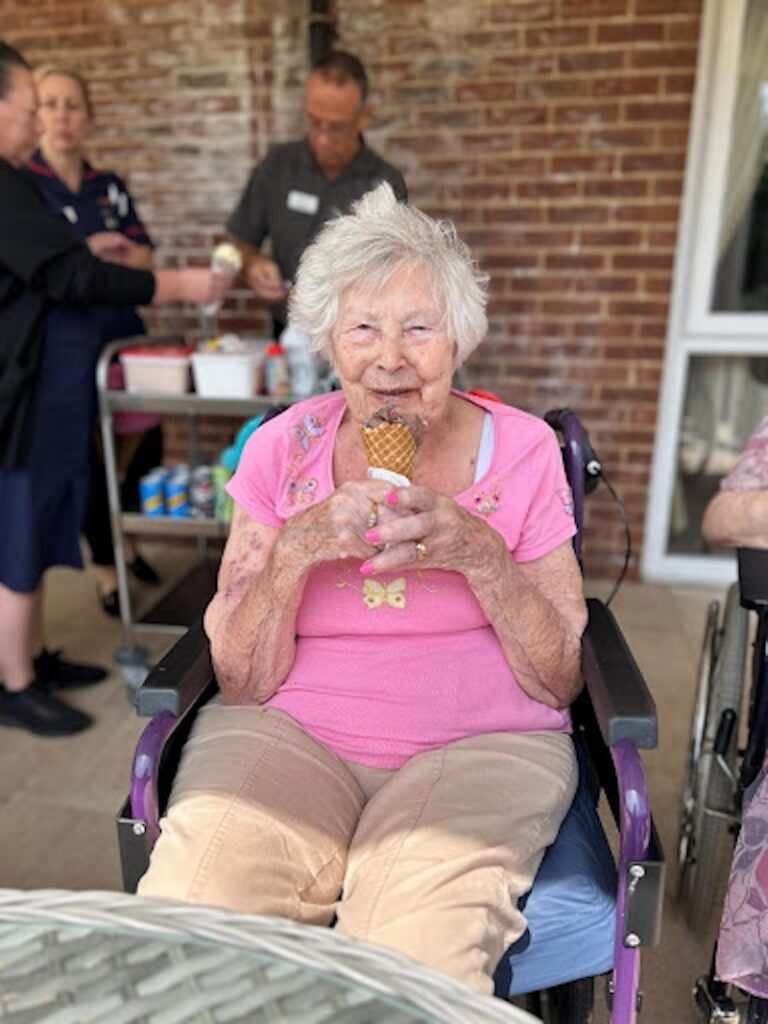 residents sat with a cone and ice cream in the garden