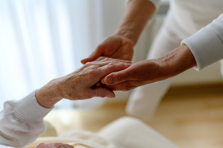 hand holding in care home