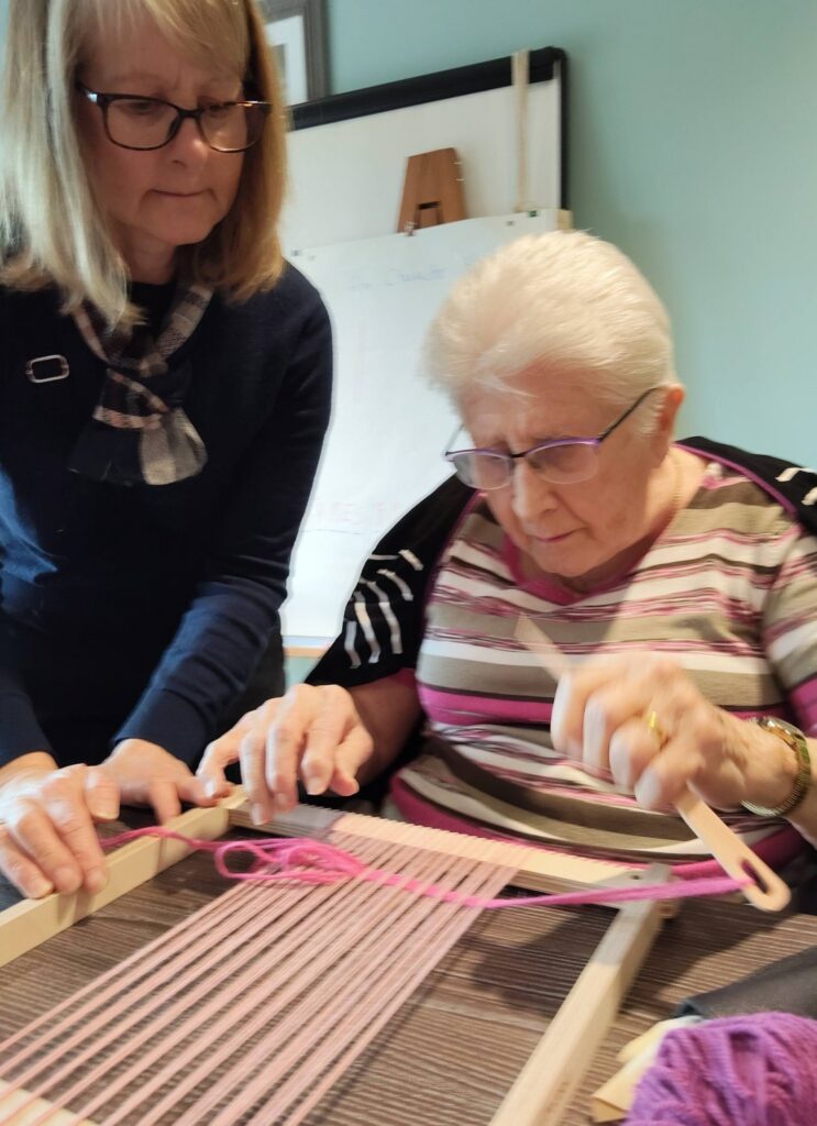 older lady weaving