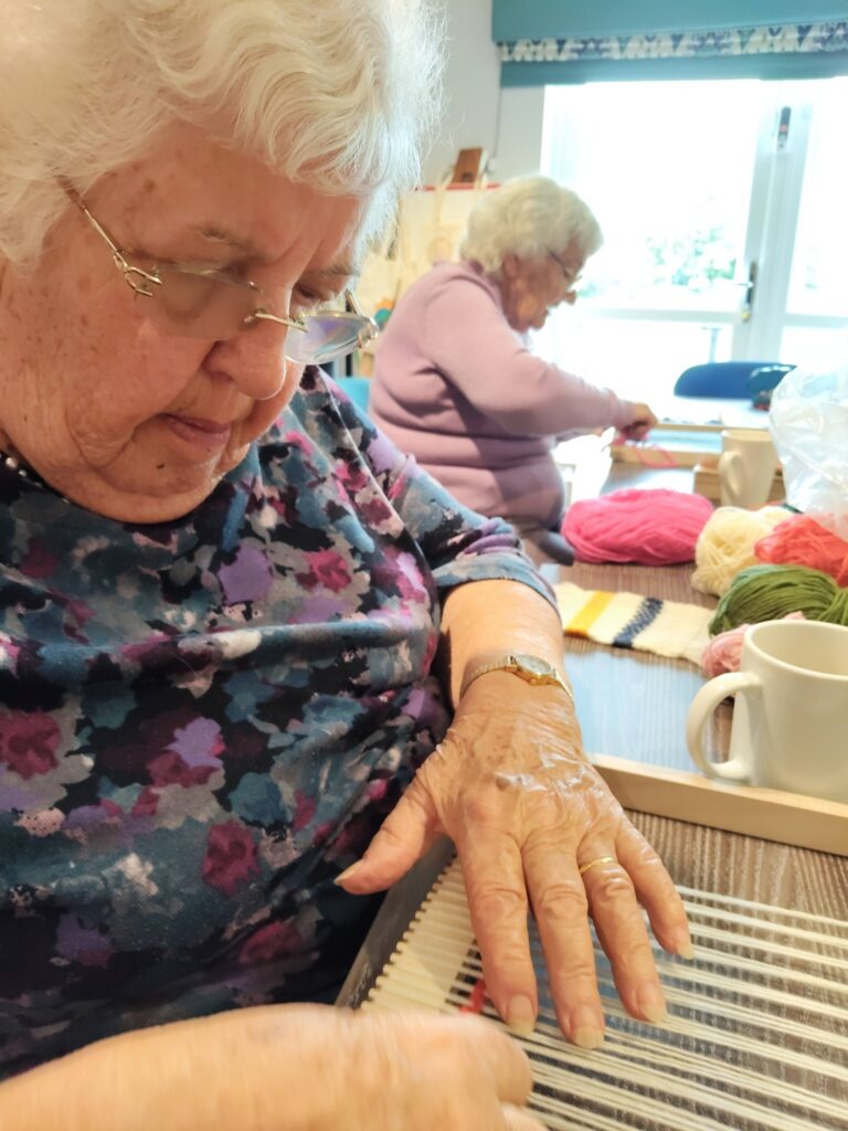 older lady weaving