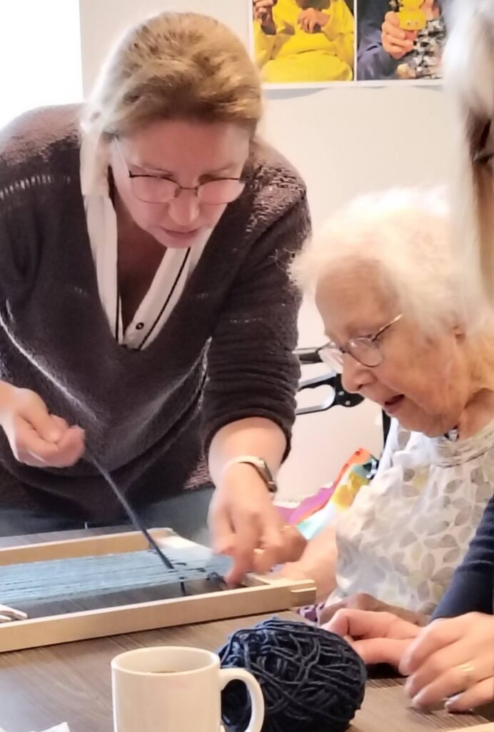 older lady weaving