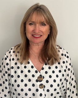 lady posing for staff photo