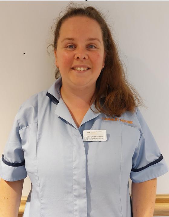 woman posing for staff photo