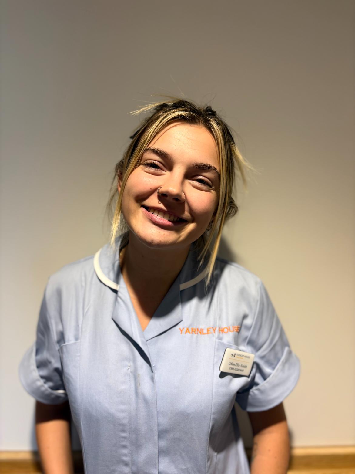 woman posing for staff photo