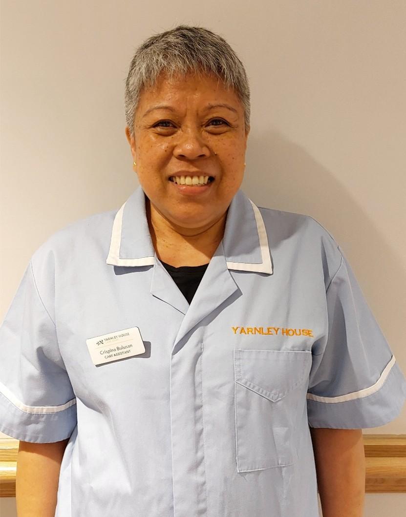 woman posing for staff photo
