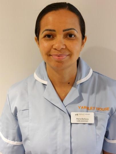 woman posing for staff photo