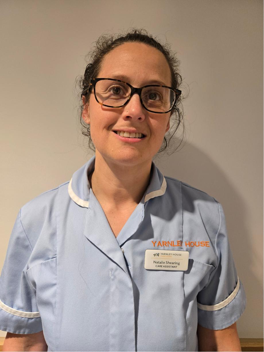 woman posing for staff photo