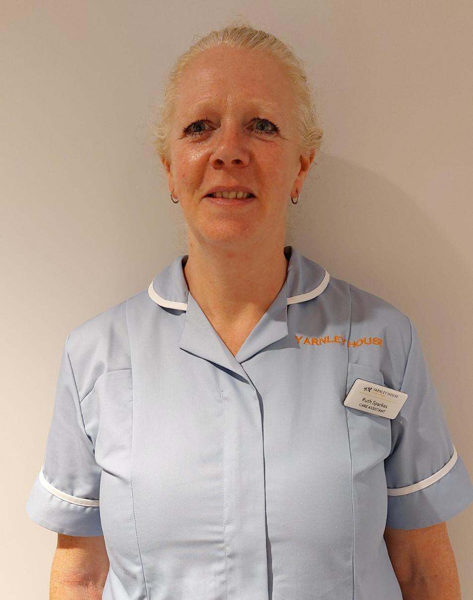 woman posing for staff photo