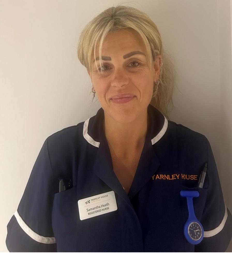 woman posing for staff photo