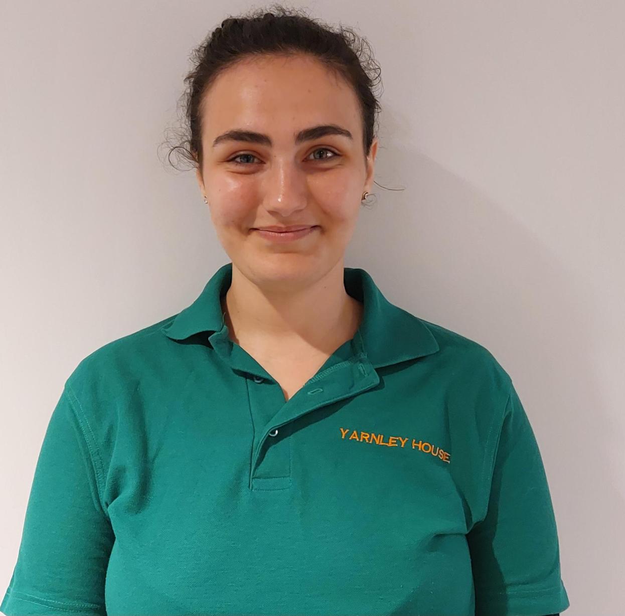 woman posing for staff photo